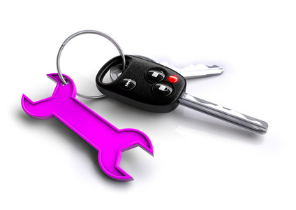 粉红色的扳手图标作为密匙环的车钥匙。汽车服务与回流