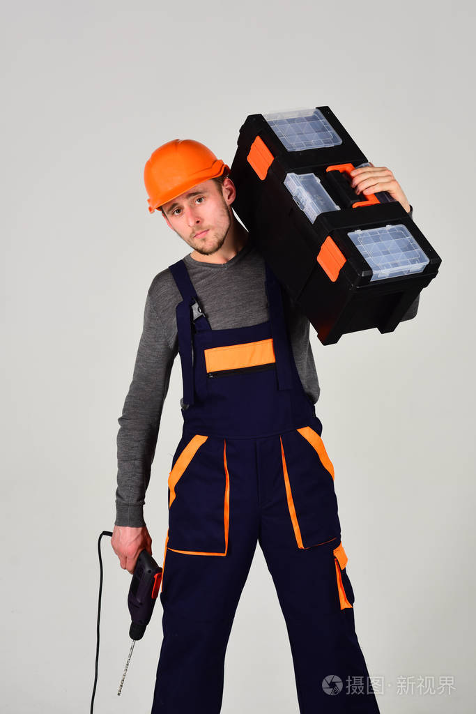 坚固和有吸引力的维修, 灰色背景, 孤立.修理工的概念.