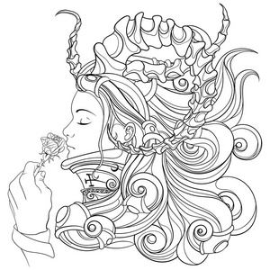 恶魔女孩嗅到美丽的玫瑰照片