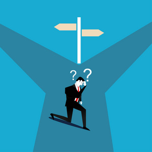 方向迷茫商人迷茫选择正确的方向前进.混淆的概念照片