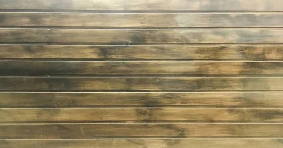 browm 木材纹理背景。木制深色板