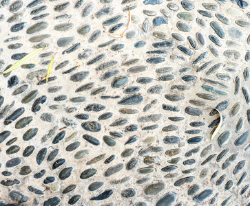 卵石在混凝土地板，纹理背景