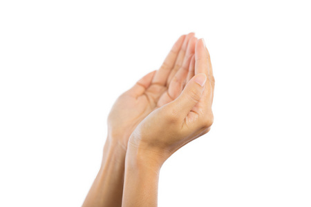 在白色背景上孤立的祈祷之手照片