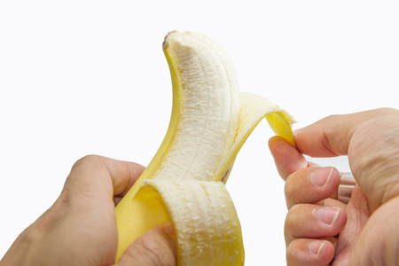白色背景上剥香蕉