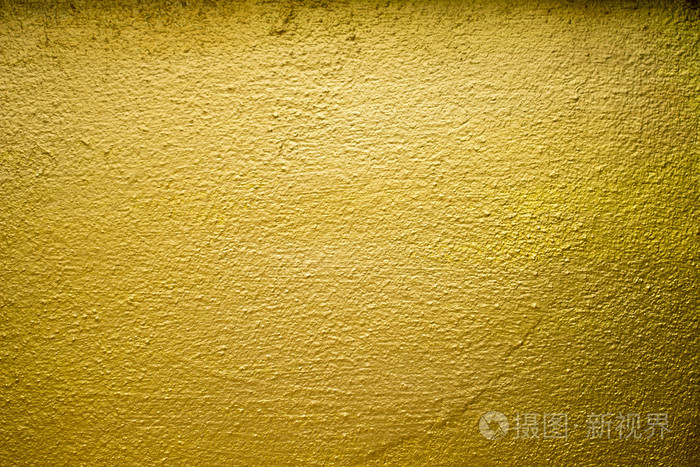 金色的水泥墙纹理背景