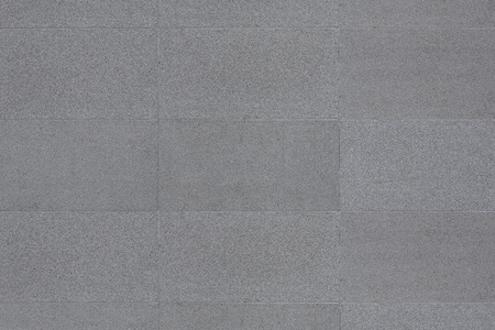 花岗岩砖灰色的水泥墙,花岗岩混凝土砖照片
