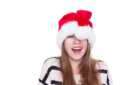 表达情感的女孩，在白色背景上的圣诞帽子