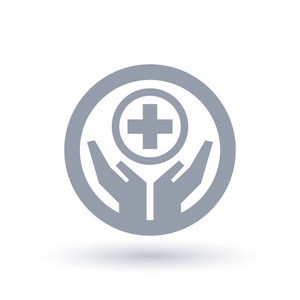 中介图标手与医疗援助十字图标.医疗保健符号照片