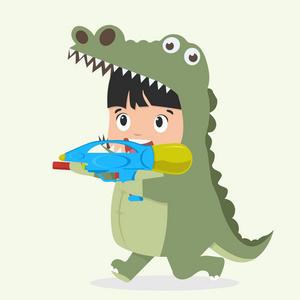 可爱的儿童鳄鱼服装与水枪图片