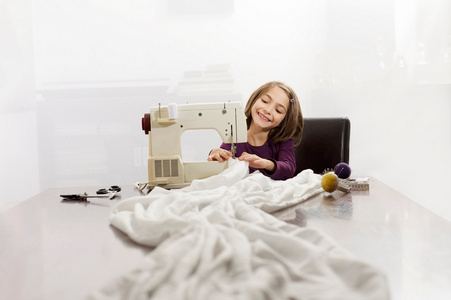 可爱的小裁缝照片