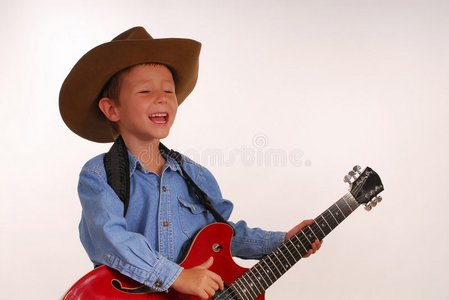 带吉他的年轻牛仔
