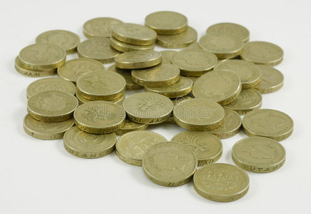 金达兰很多英镑的硬币照片