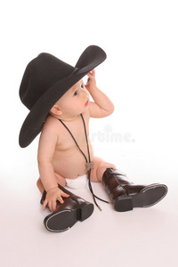 戴帽子穿靴子的婴儿