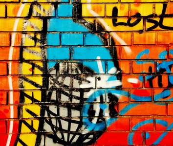 uv喷绘砖石墙上的彩色涂鸦喷绘艺术照片