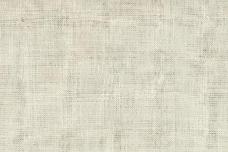 白色粗麻布背景黄玉米籽粒在麻布袋麻布粗麻布或解雇背景天然复古亚麻