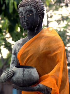 拿着施舍碗的佛照片