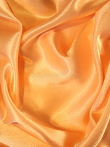 光滑典雅的金色丝绸为背景