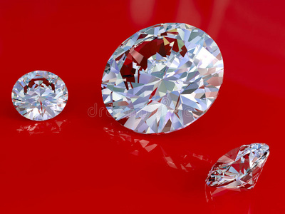 红色光泽背景上的大小钻石照片