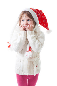 戴着圣诞帽的小女孩在等圣诞节
