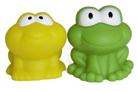 白色背景隔离的玩具橡胶蛙图片