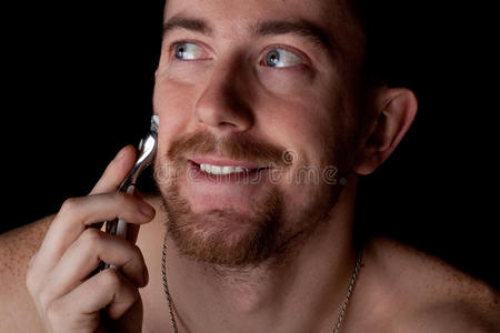 男人刮脸.特写镜头.照片