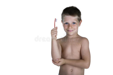 小男孩拿着牙刷，摄影棚拍摄