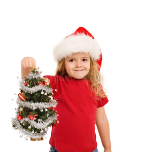 抱着小圣诞树的小女孩