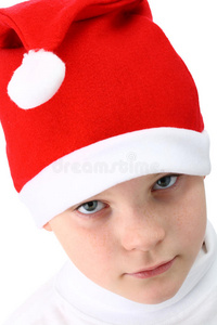 戴圣诞帽的小男孩被隔离在白色