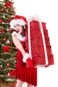 圣诞女孩在圣诞老人手里拿着叠礼盒。