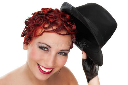 性感的年轻女子，戴着帽子，化着现代的妆