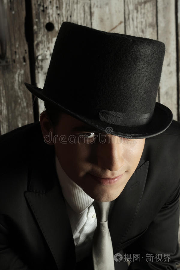 戴帽子的人电影英雄穿晚礼服的男人戴礼帽的人主严肃的男人肖像好色之