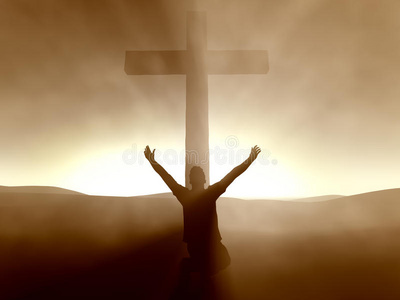 跪在耶稣基督十字架前的人照片