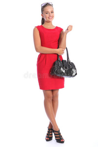 穿着红裙子高跟鞋的漂亮时髦年轻女人