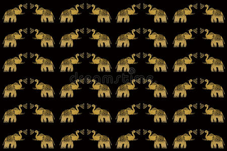 黑色无缝背景上的金色大象图片
