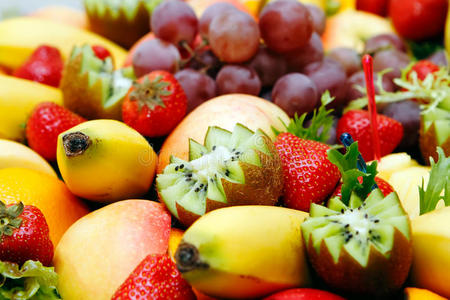 哈密瓜香蕉芒果水果捞五彩缤纷的水果照片