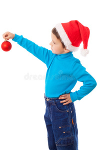 戴着红色装饰圣诞帽的小男孩