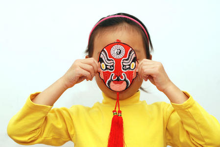 京剧面具与小女孩图片