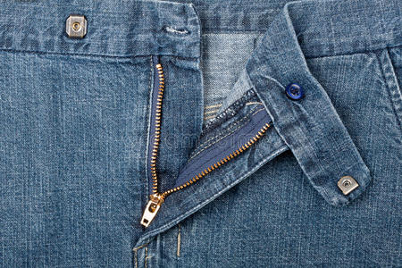 拉链特写牛仔裤拉链打开金属拉链牛仔布背景蓝色牛仔裤配拉链旧牛仔裤