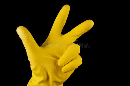 手戴黄手套做标志树手指