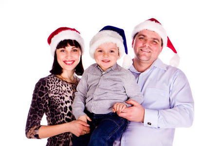 戴着圣诞帽的幸福家庭
