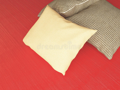 红色地板上的棕色纺织枕头。