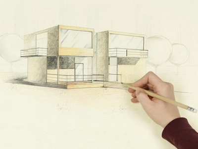 女子手绘房屋建筑素描照片