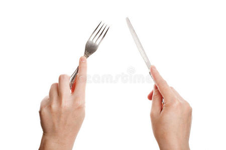 手拿刀叉照片