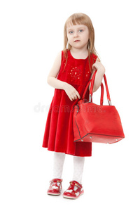 红色手提包的时尚小女孩