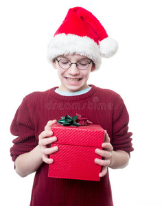 带圣诞帽和礼物的少年男孩图片
