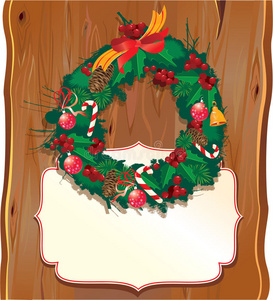 木制背景的圣诞花环