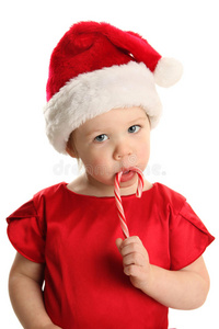 吮吸圣诞糖果的婴儿