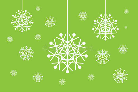圣诞雪花球体被隔离在绿色上图片