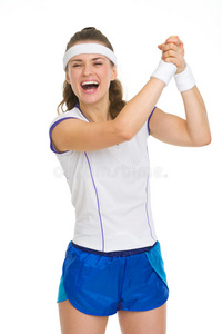 快乐的女网球运动员欢庆成功图片
