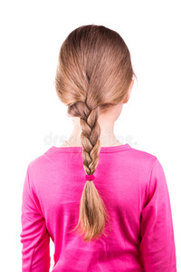 一个漂亮的小女孩的肖像,长发辫子.护发理念.照片